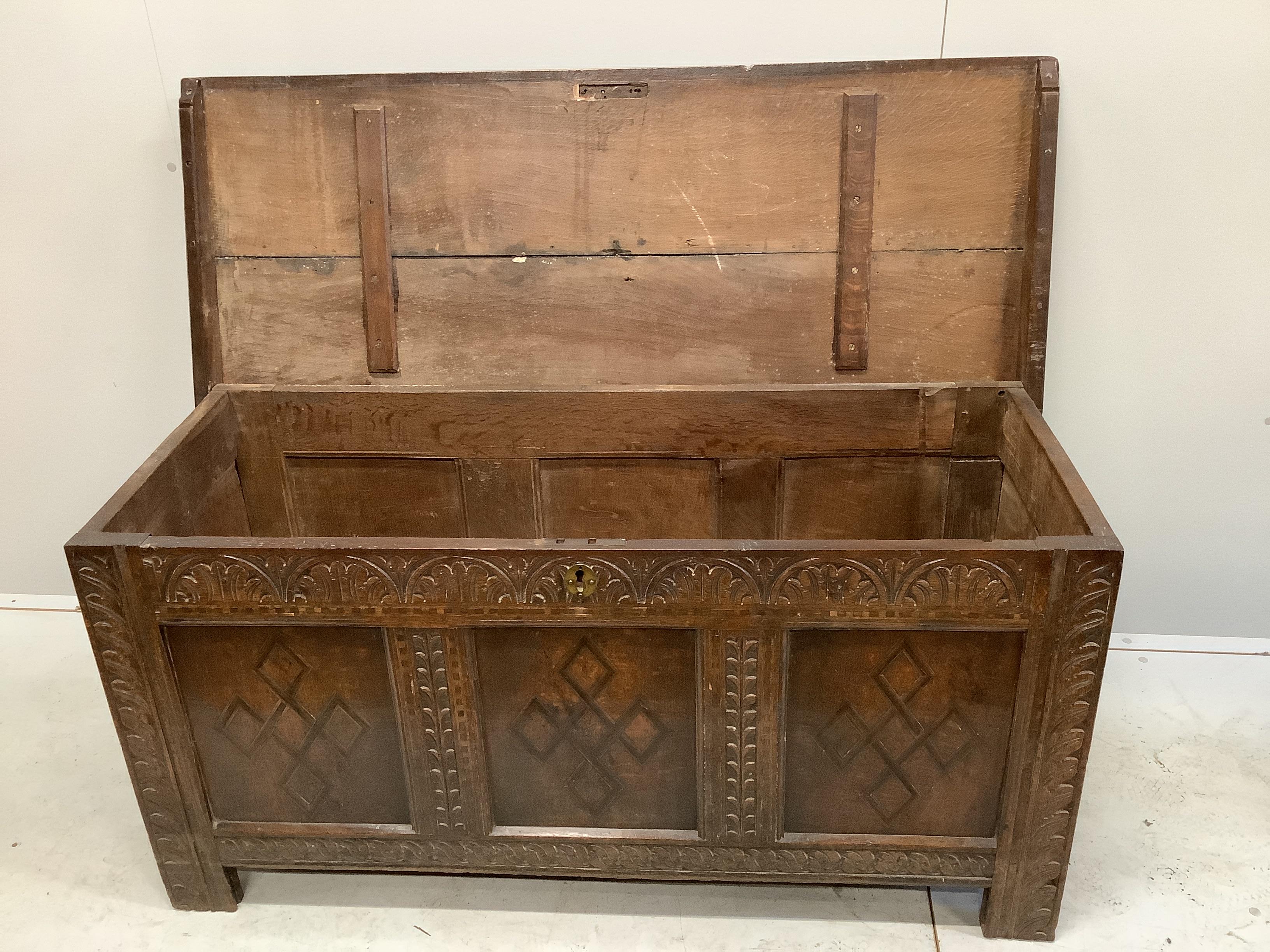 A 17th century oak coffer, width 133cm, depth 53cm, height 63cm	